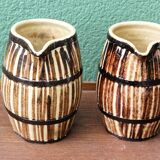 Pair of trompe l'oeil bistro pitchers, barrels