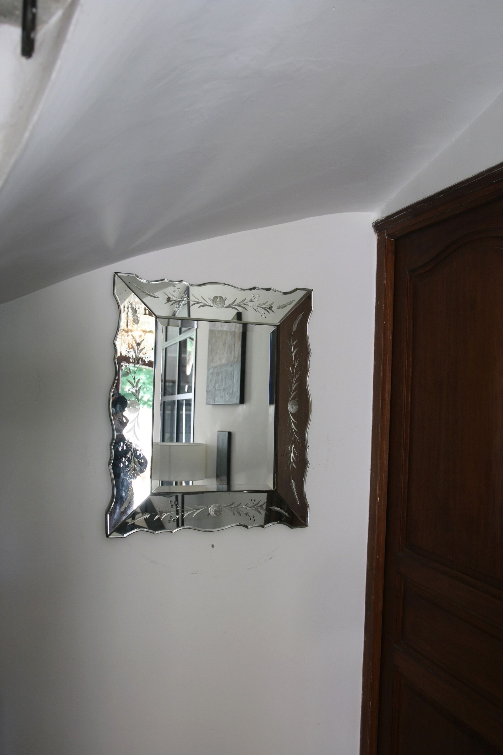 Bevelled Venetian mirror from the 1950s.