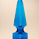 large blue glass obelisk-shaped bottle or vase