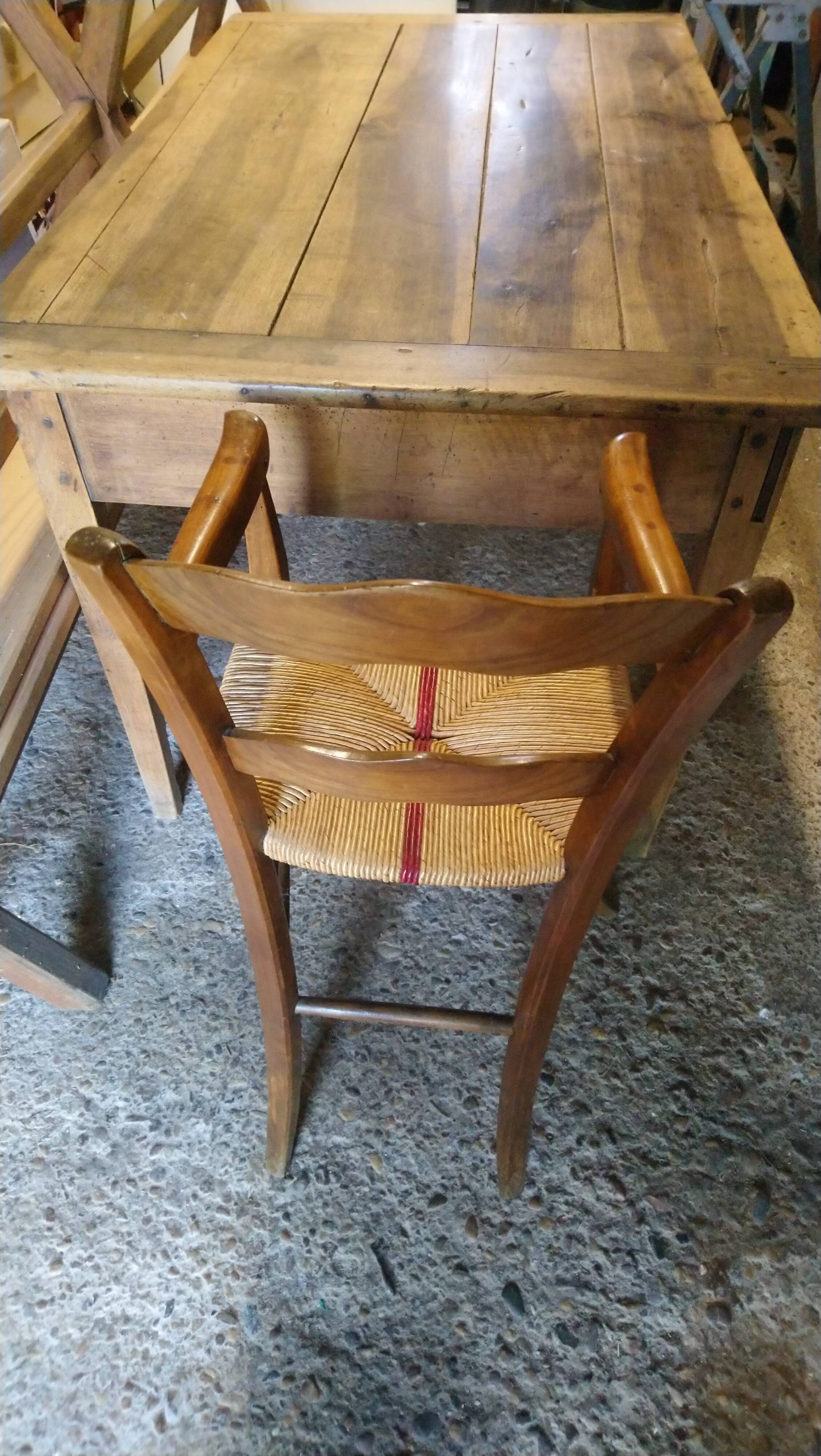Child's high chair with a rush seat in walnut