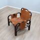 A vintage Tito Agnoli armchair leather and bamboo 1960s