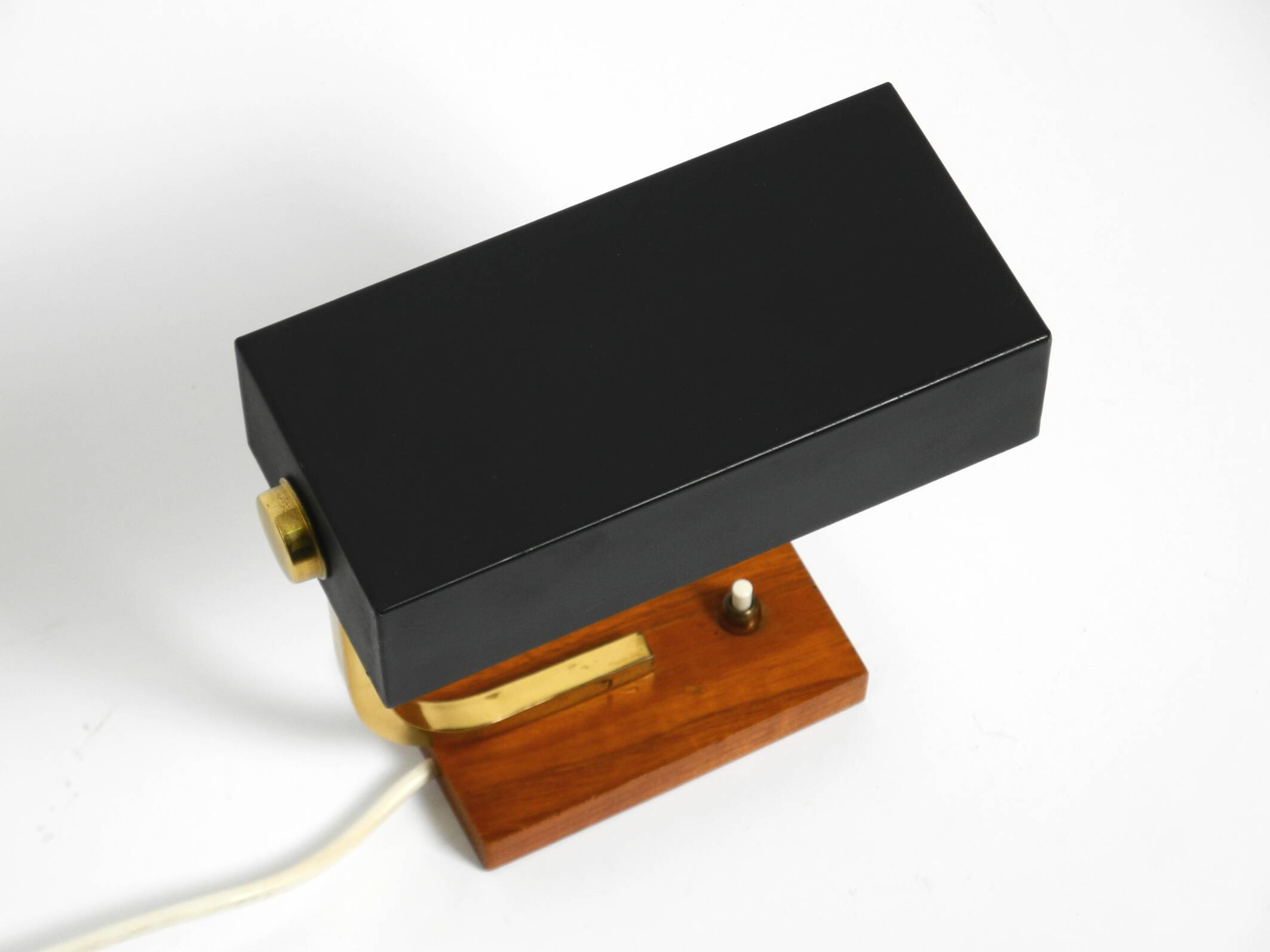 Beautiful small Mid Century Modern metal and brass table lamp with teak bas