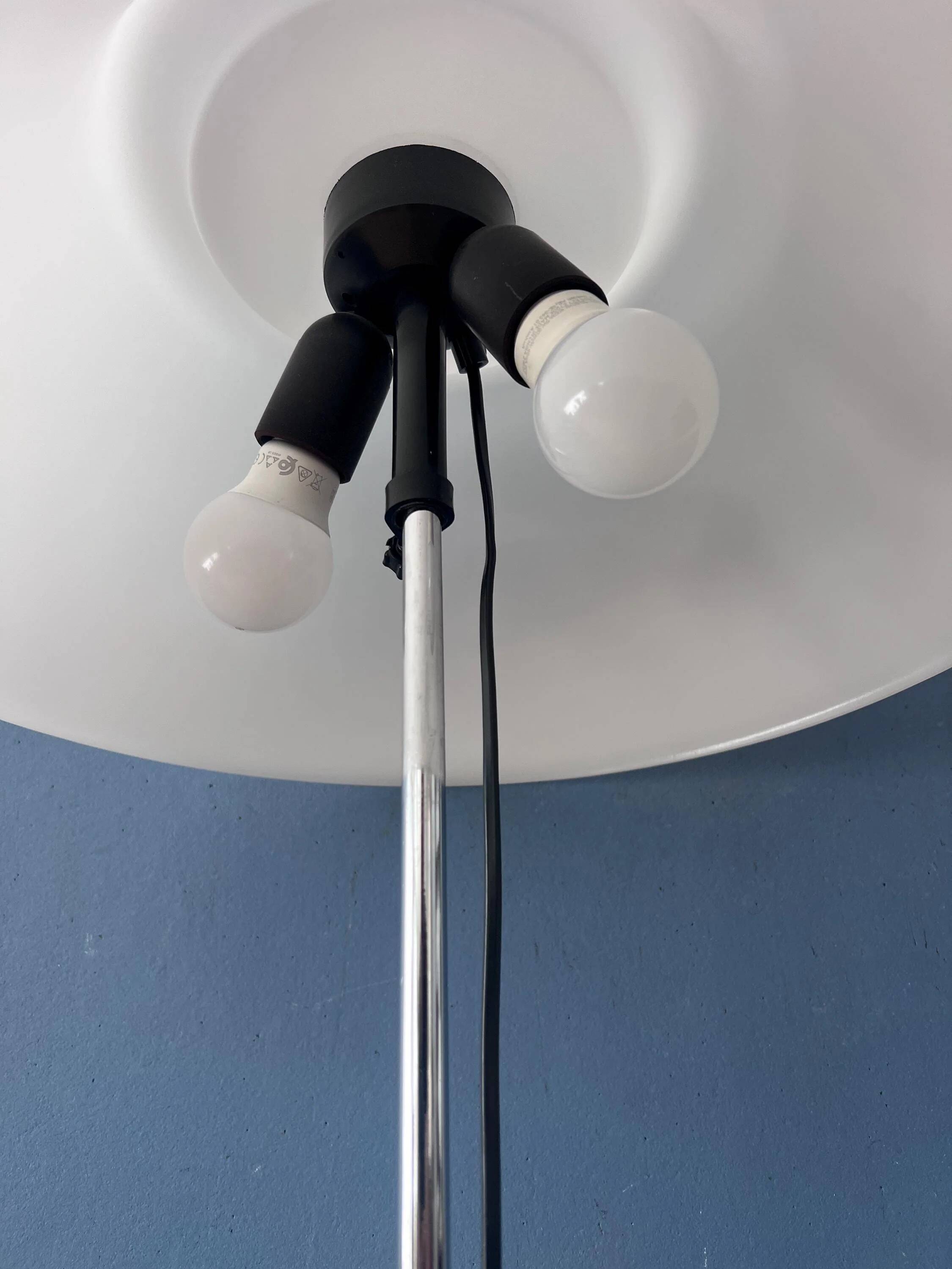 Vintage Space Age floor lamp with white plexiglass UFO shade.