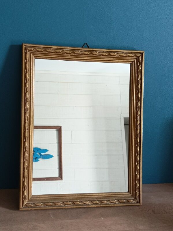 Mirror carved carved patinated gilded wood