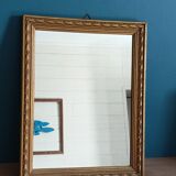 Mirror carved carved patinated gilded wood