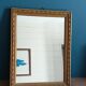 Mirror carved carved patinated gilded wood