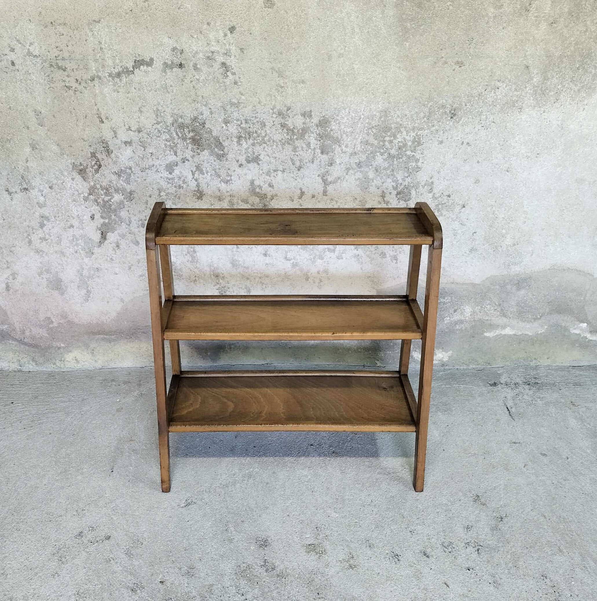 Vintage shelf on wooden legs in wood