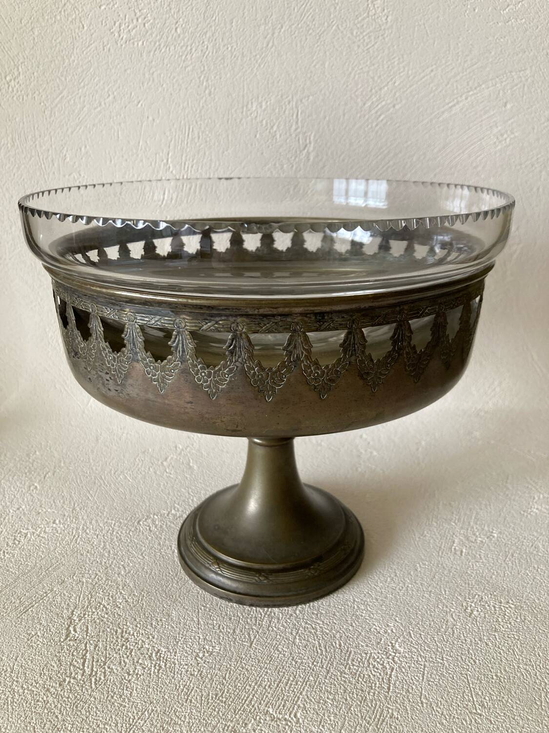 Antique crystal fruit bowl on a brass pedestal