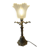 Original table lamp with golden metal elements and tulip shape.