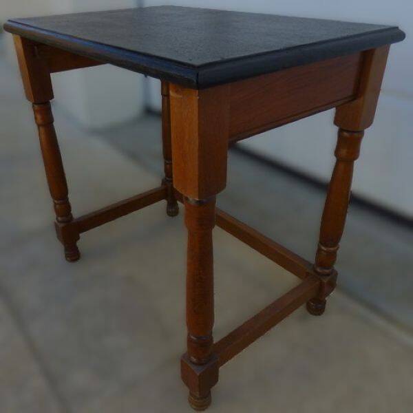 Nightstand or side table in solid wood with a black top.