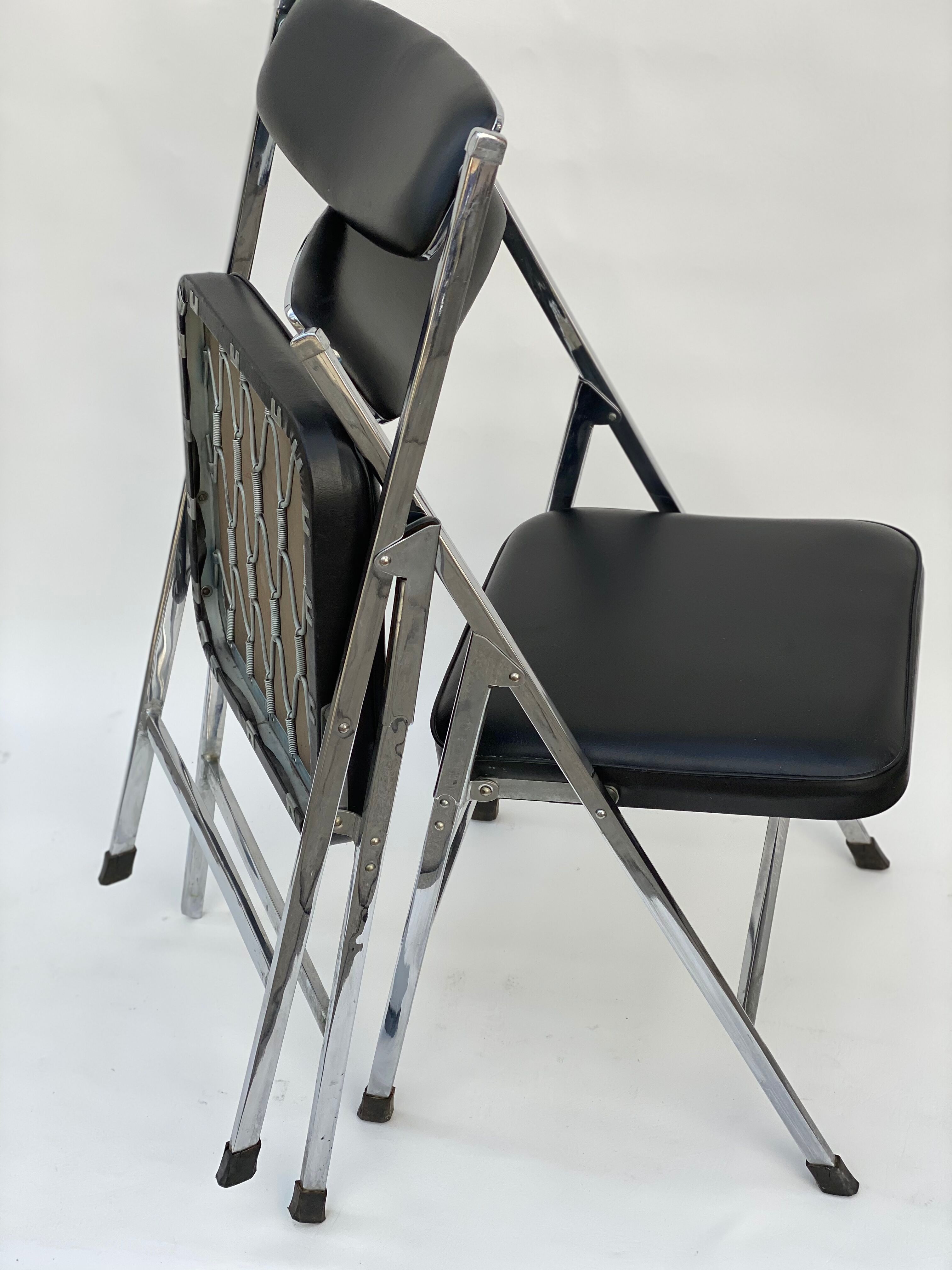Pair of italian chrome and leather folding chairs