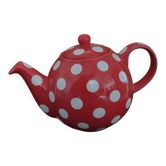 Pretty round English teapot with red polka dots.