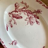 Old oval dish in iron earth