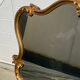 Turned champ-shaped mirror