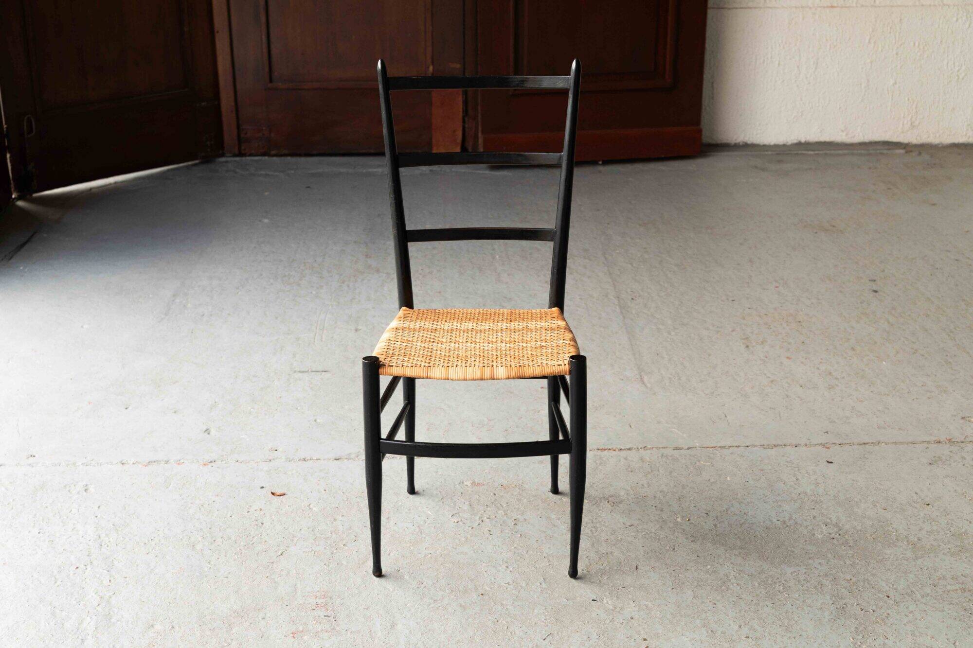 Set of 8 dining chairs ‘Baletta’ by Enrico Delmonte
