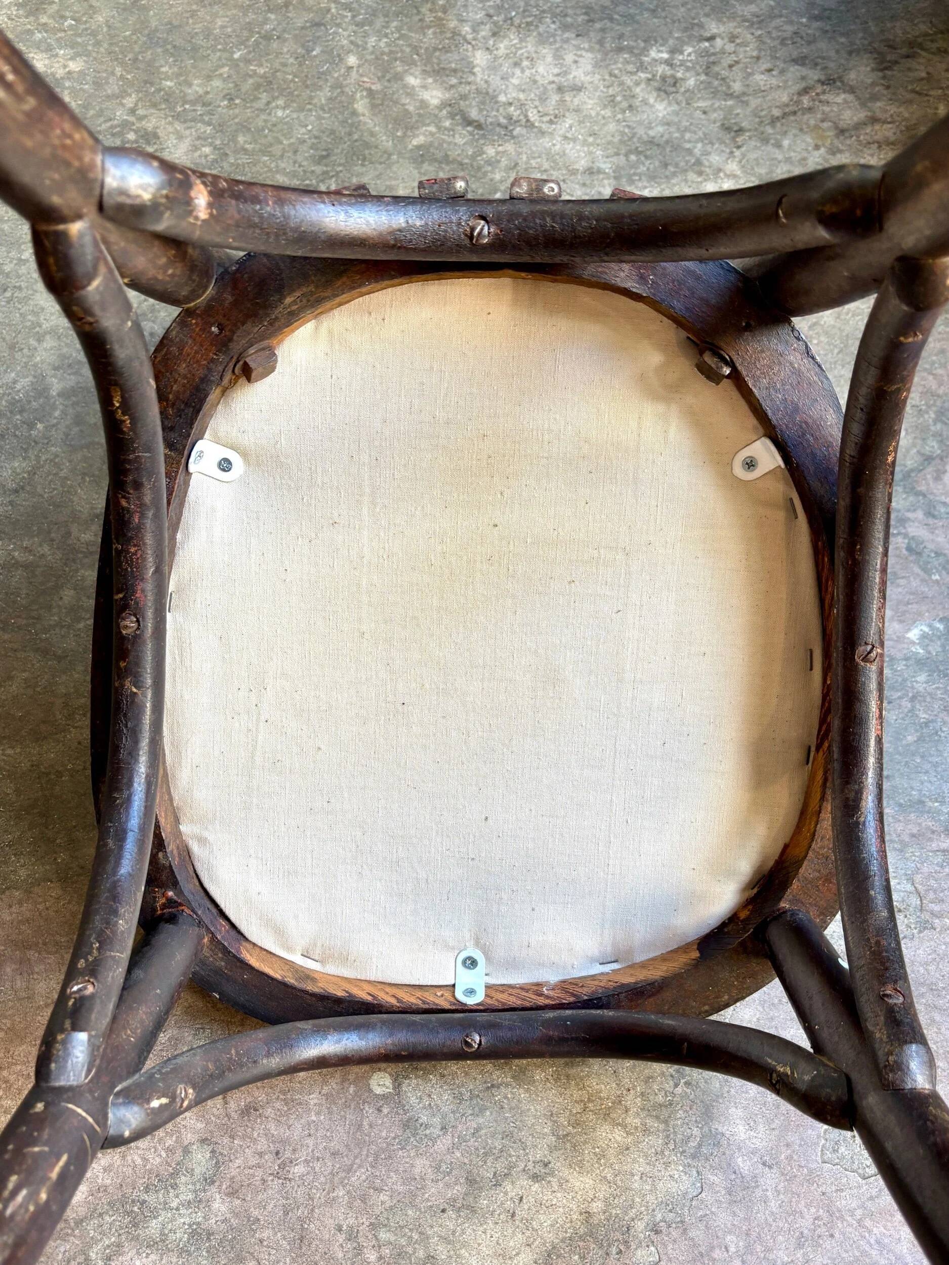 Bistro chair in bent beech and beige mixed fabric.