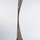 Indonesian construction element in carved wood with intertwined plant motifs mounted on a base (fri
