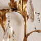 Hand-forged wall lamp gilded with gold leaf and crystals, Italy