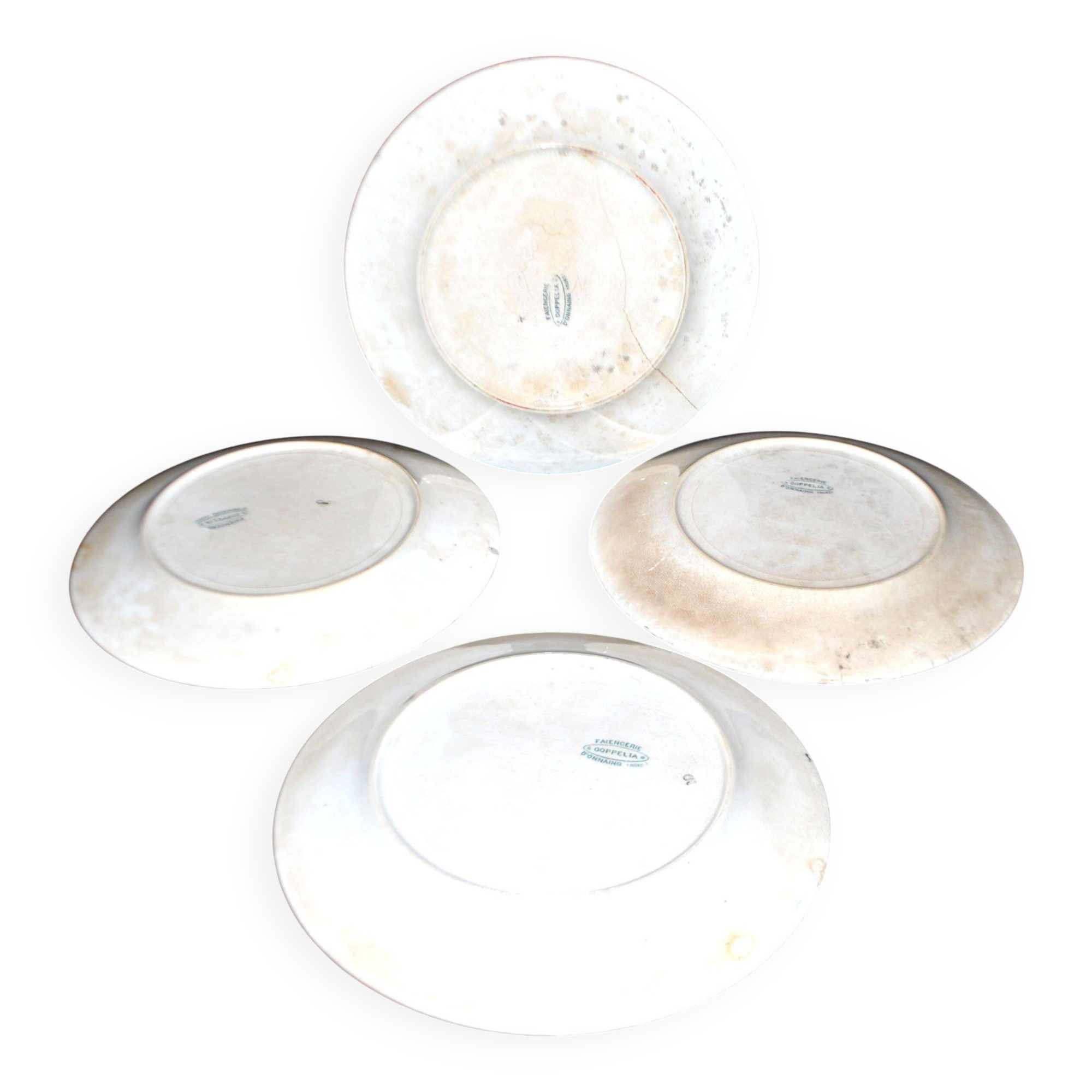 Onnaing Faïencerie set of 4 Coppelia plates with green floral decoration, iron earthenware