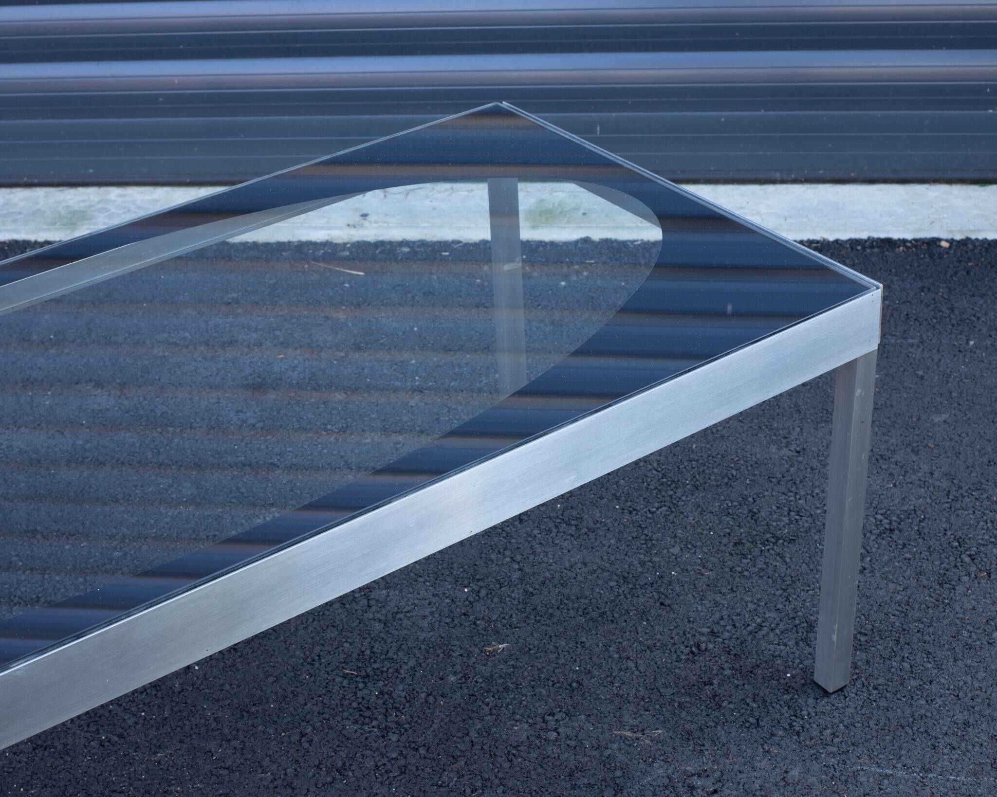 Glass coffee table with brushed aluminum legs, 1970