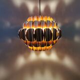 Copper colored hanging lamp. designed by thorsten orrling sweden