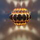 Copper colored hanging lamp. designed by thorsten orrling sweden