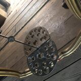 Venetian mirror topped with half a chandelier of Murano