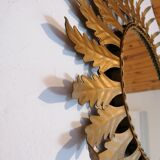 Oval sunburst mirror with leaves of acanthus 1960s