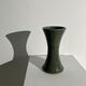 Dark green handcrafted vase with glazed ceramic grass blades