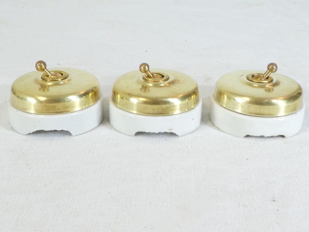3 Old Porcelain switches and vintage industrial brass