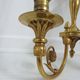 Pair of double wall lamps directoire style Lucien Gau in solid bronze gilded with bright gold
