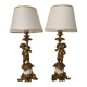 Pair of bronze lamps with puttis