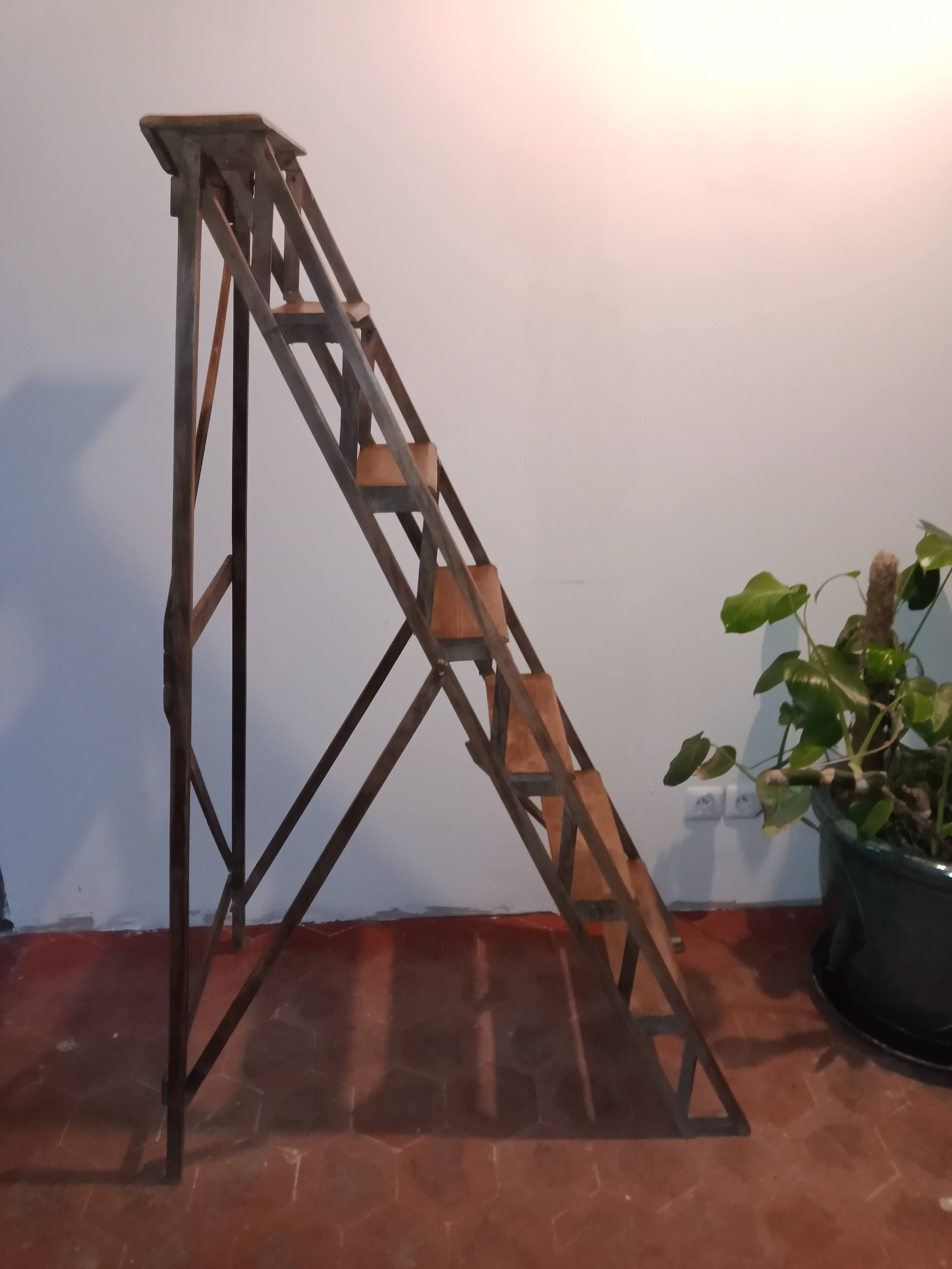 Old wooden stepladder six steps