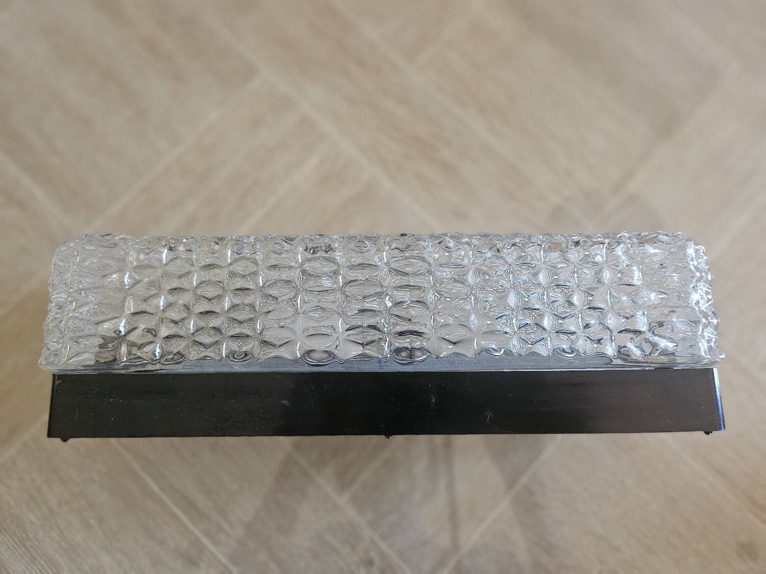 Hammered glass wall light