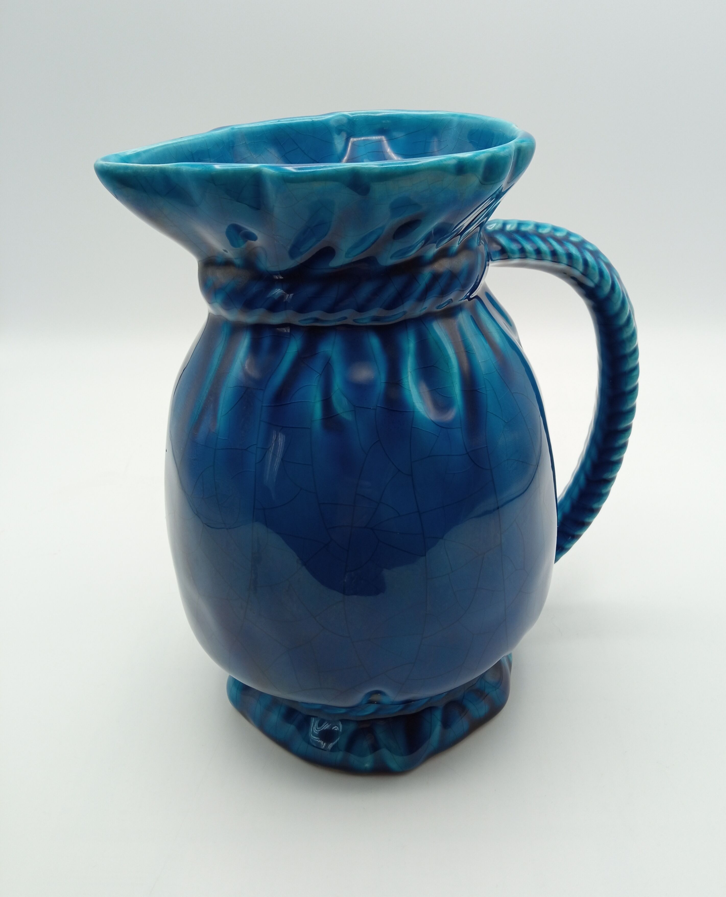 Pitcher in cracked blue Charolles earthenware