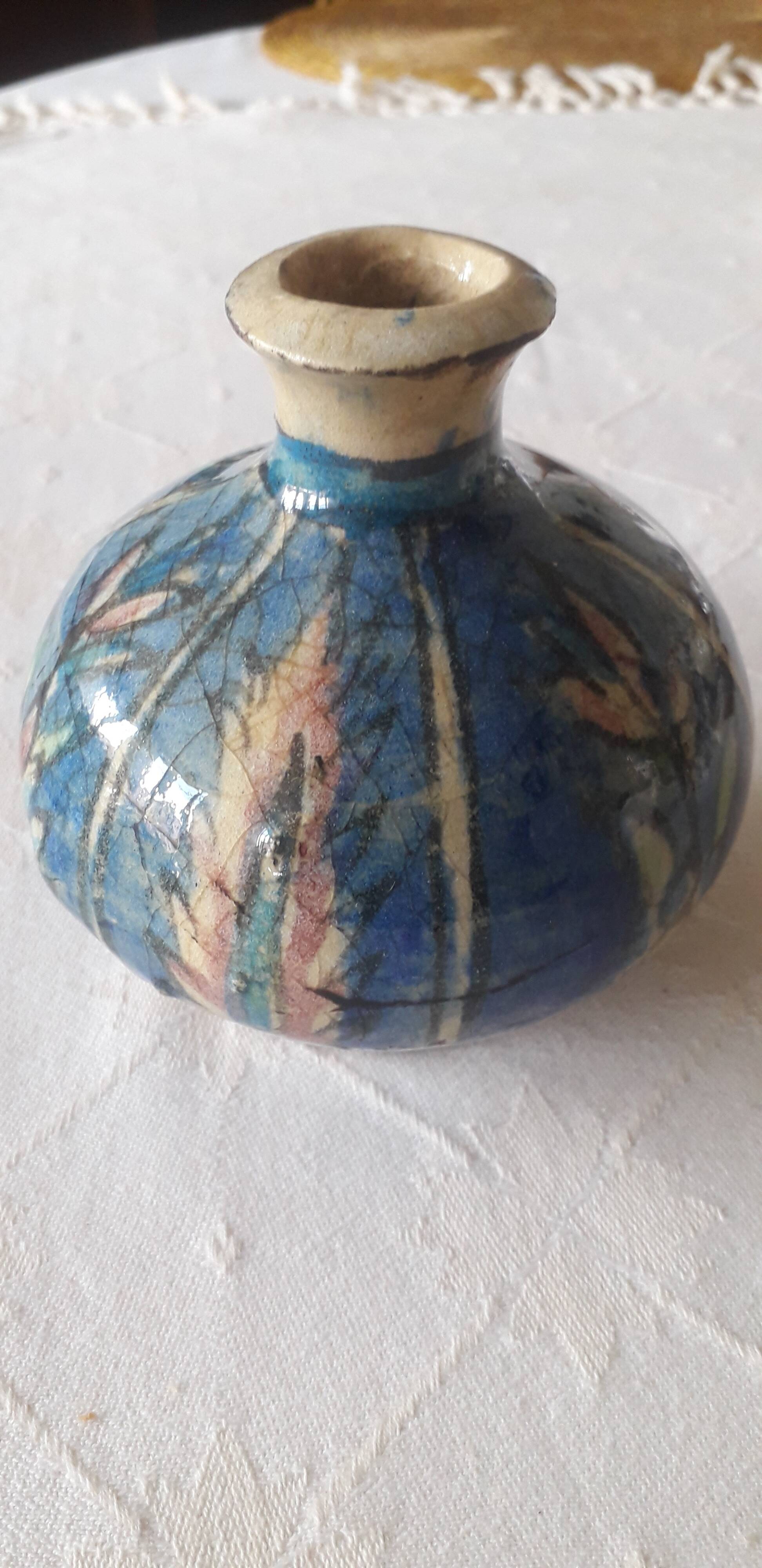 A very original antique vase with a floral design.