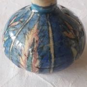 Very original antique vase with a floral decoration.
