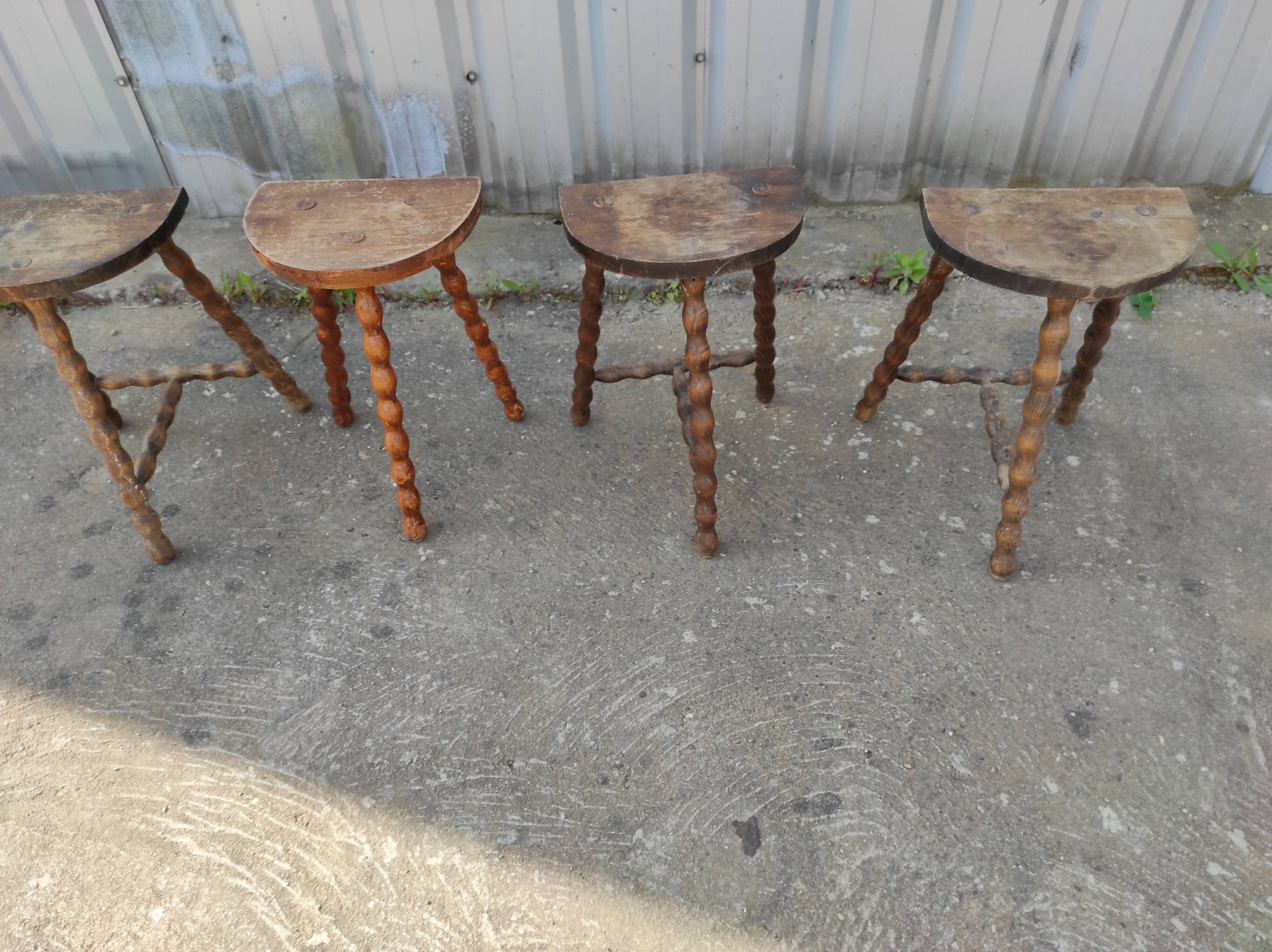 Lot 4 twisted wood tripod stools
