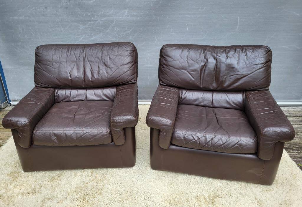 Pair of chocolate leather lounge chairs
