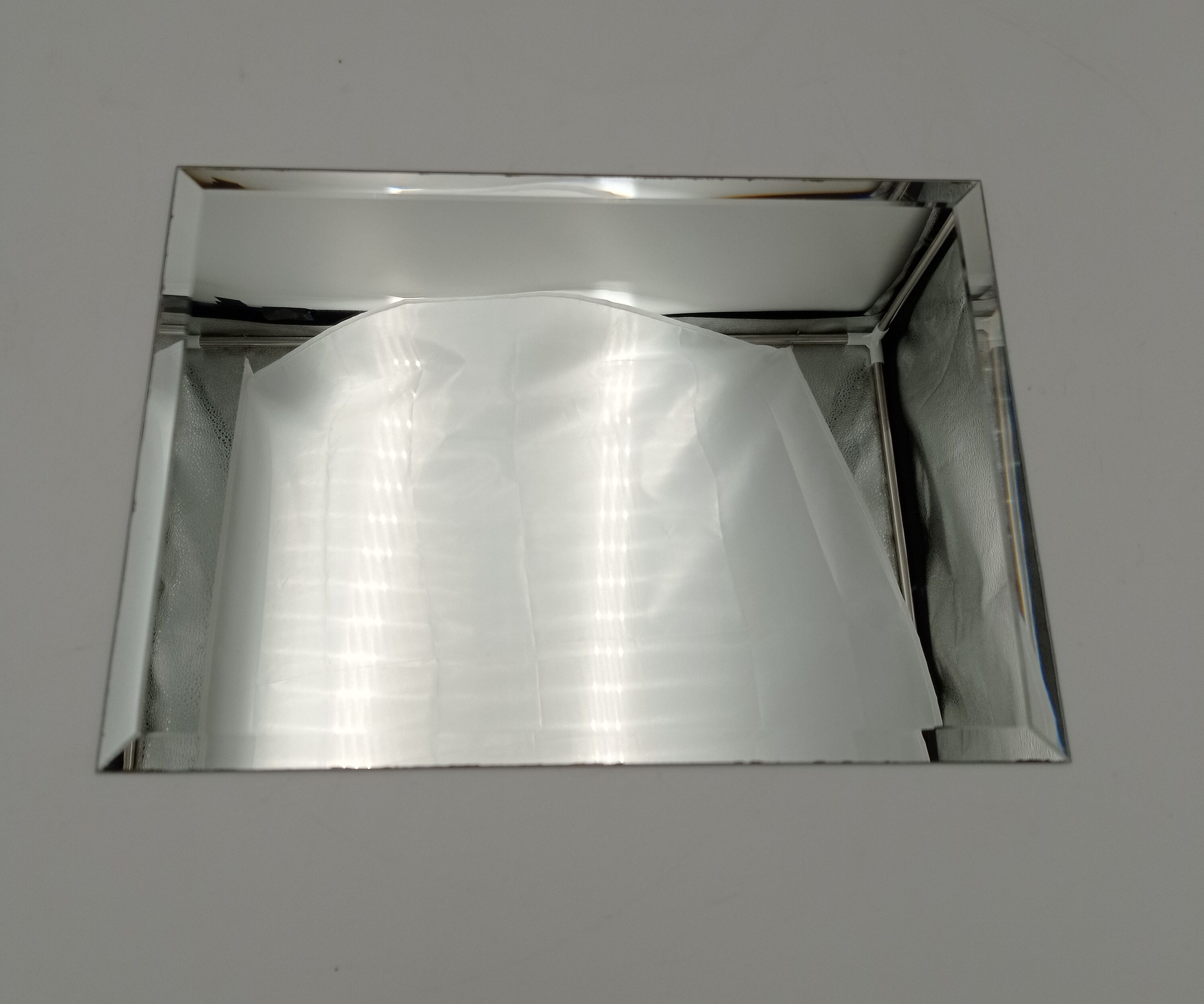 Beveled mirror 35x25 cm