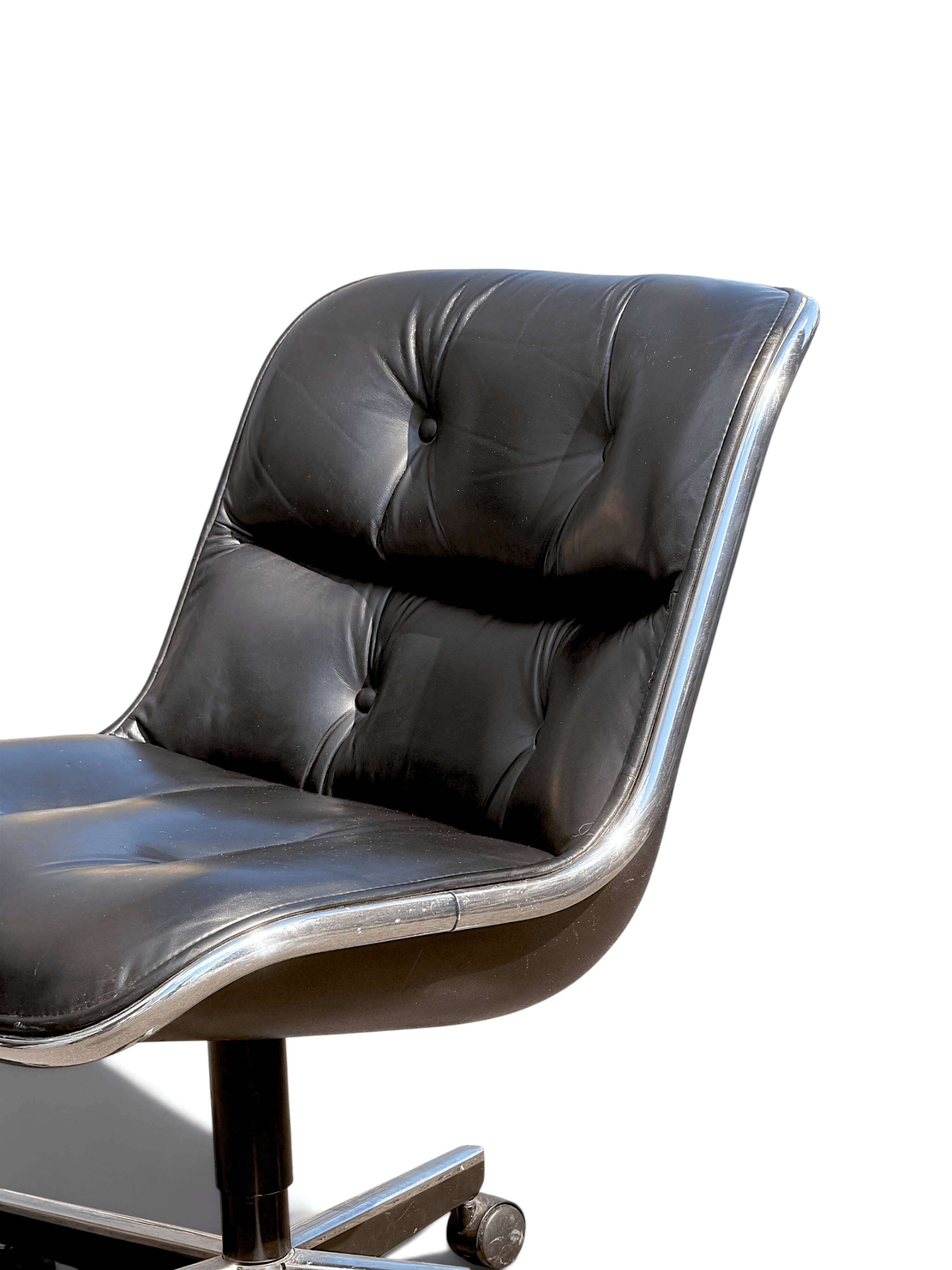 Charles Pollock Knoll office chair in black leather without armrests.