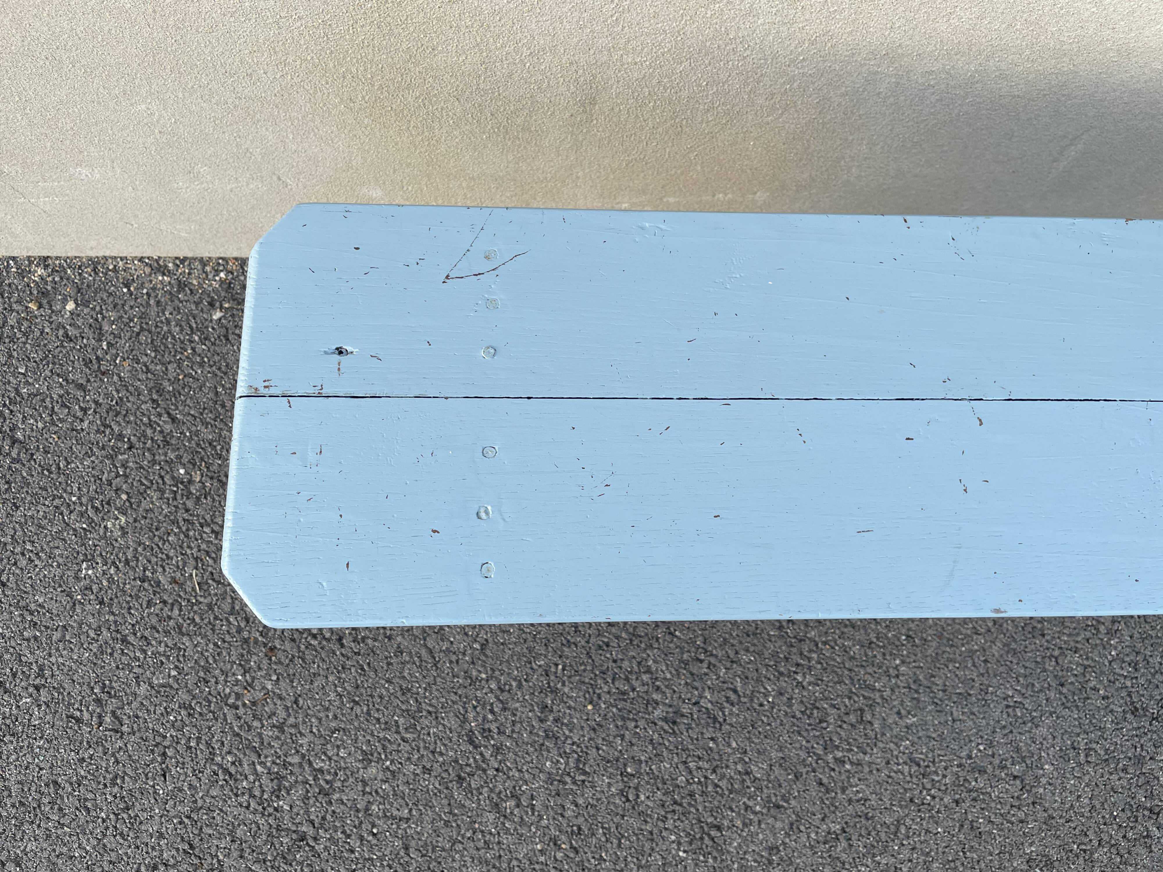 Blue painted wooden bench