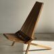 Foldable designer armchair in wooden slats