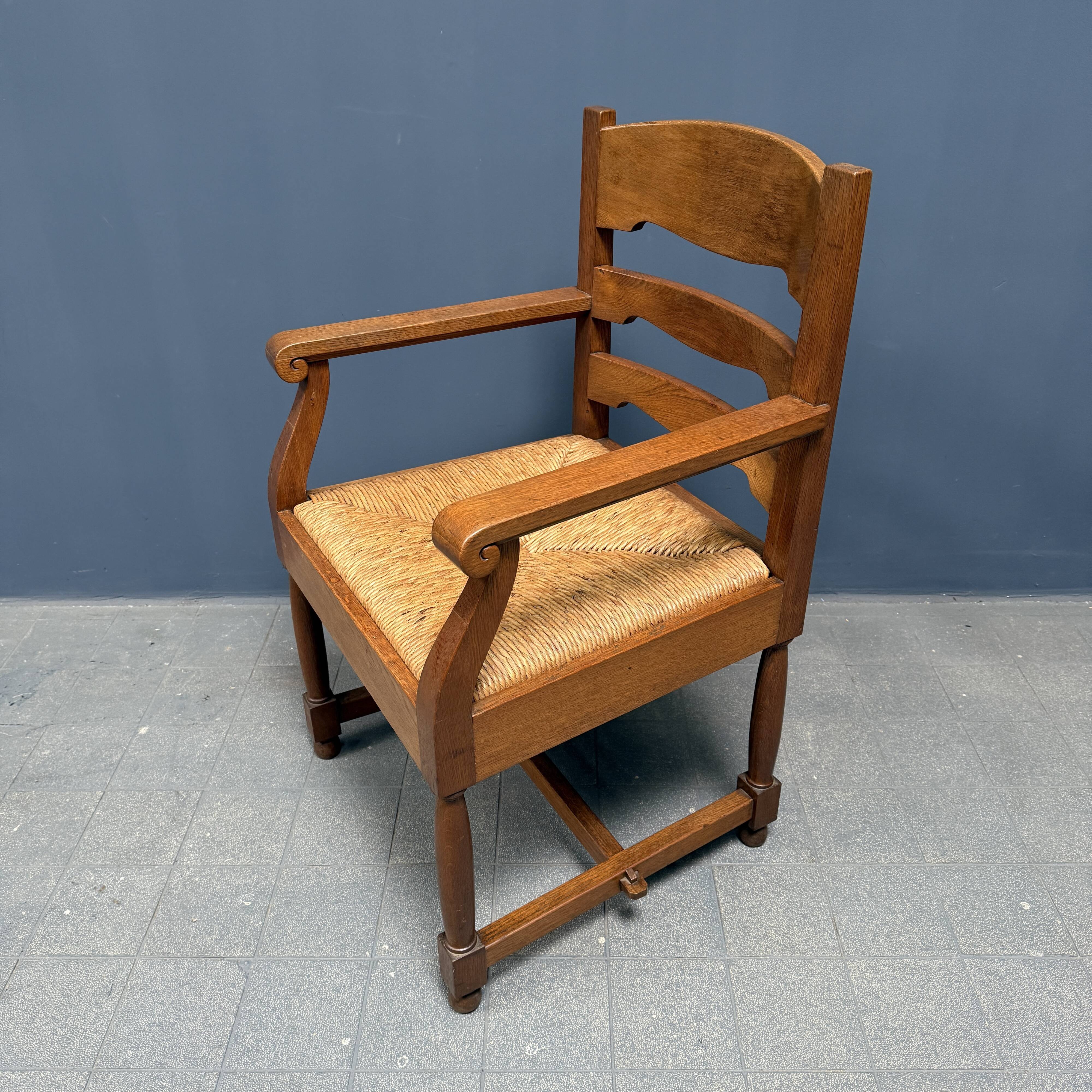 Set of two Dutch oak armchairs with rush seats