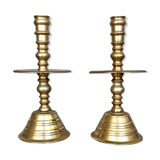 Pair of bronze church candle holders