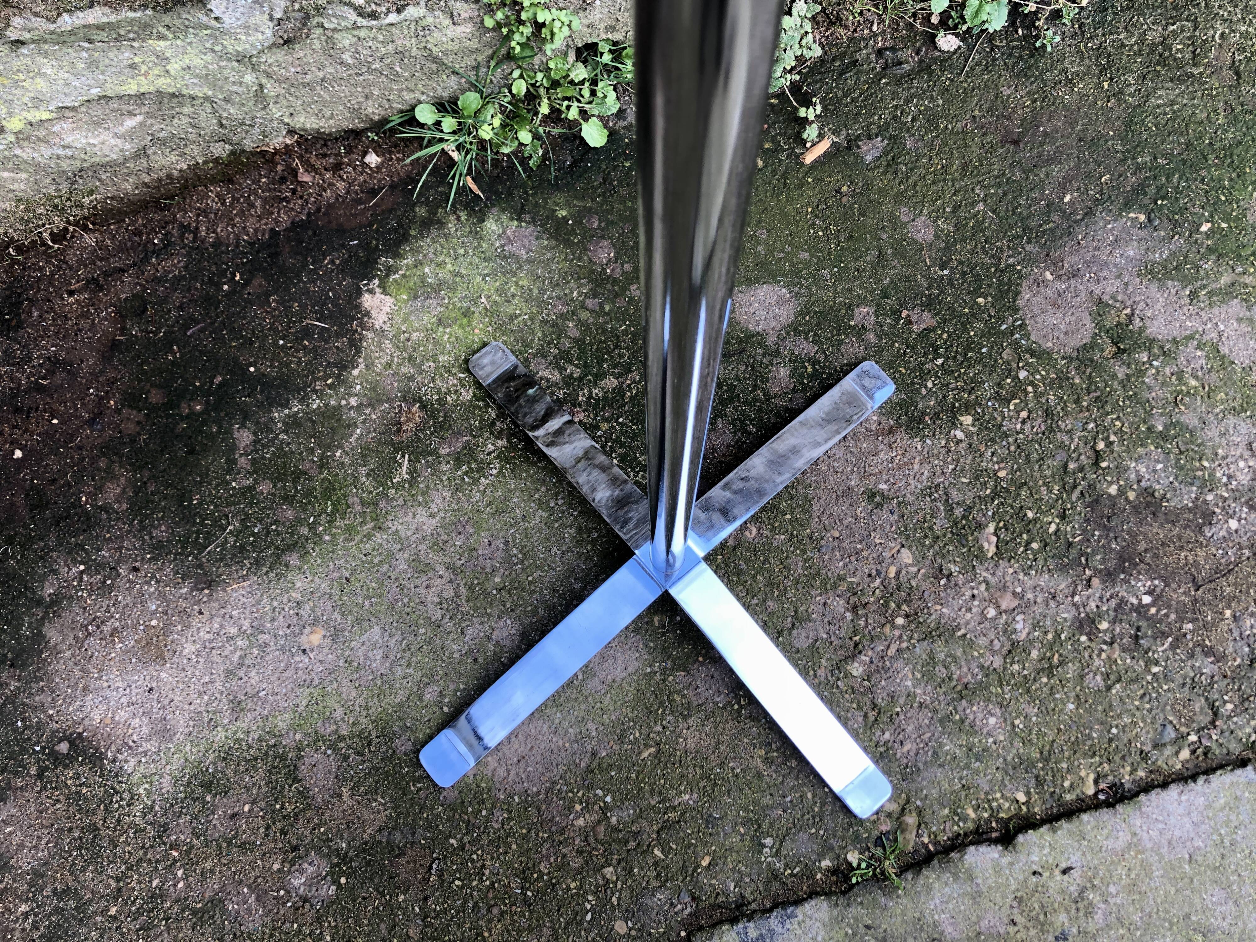 Coat rack on foot with chrome slats
