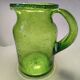 Bubble glass pitcher in the style of Biot or Empoli.