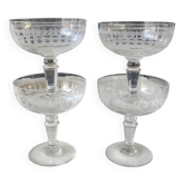 Lot of 4 x Champagne Coupes in Baccarat crystal. Engraved decoration with Greek friezes.