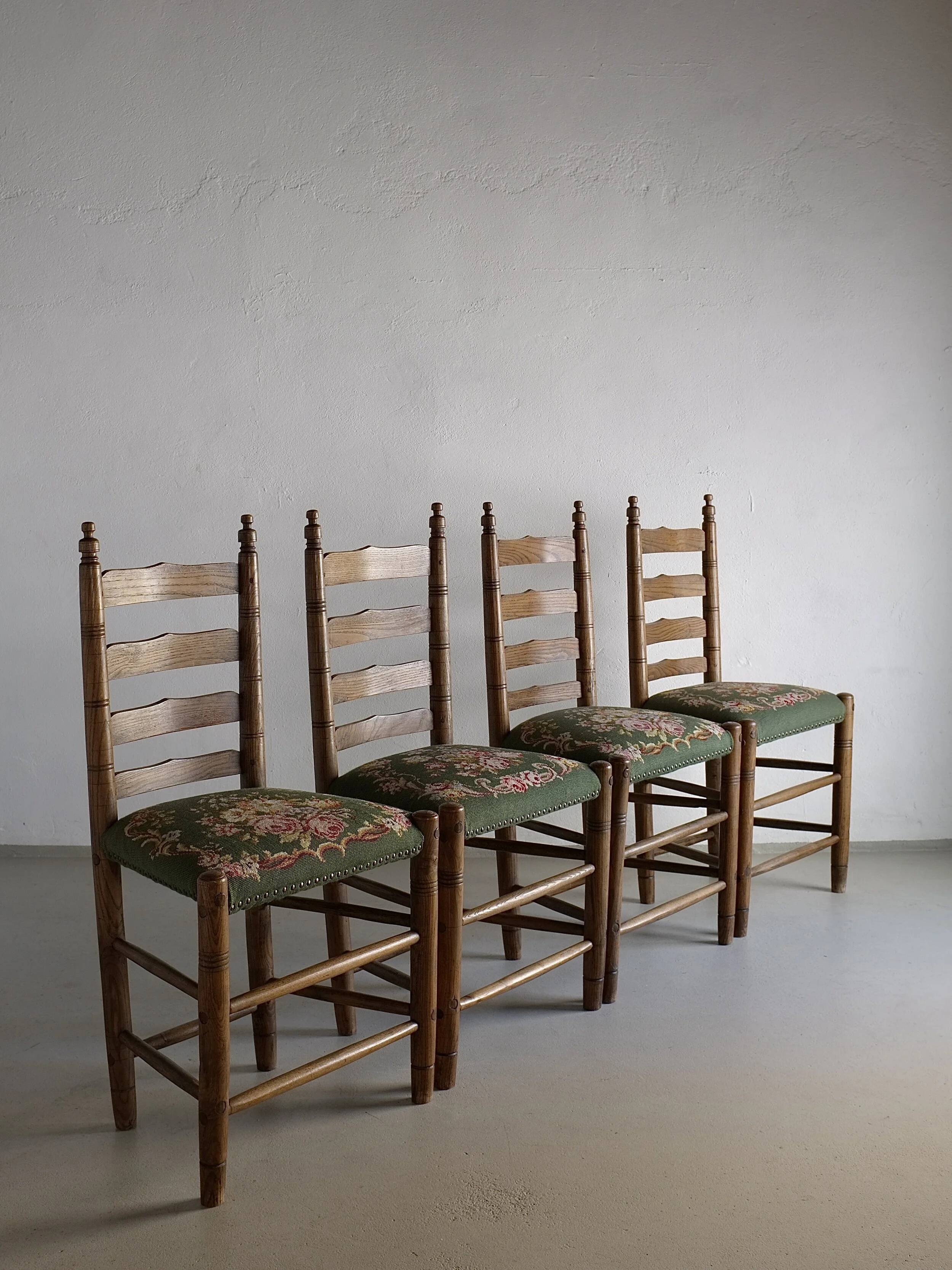 Rustic ladder-back oak chairs with embroidered seats | Netherlands | 1950s