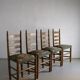 Rustic ladder-back oak chairs with embroidered seats | Netherlands | 1950s